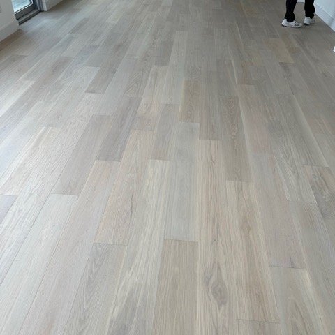 French Bros Light Wood Flooring In A Living Room